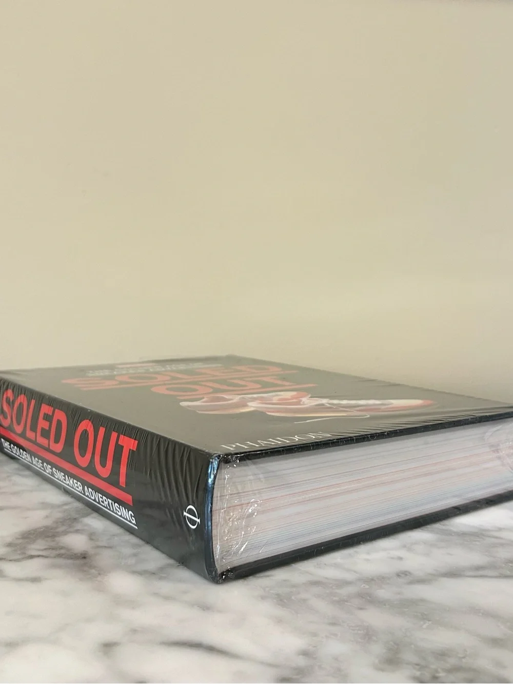 Hardcover Soled Out: The Golden Age of Sneaker Advertising • By: Phaidon